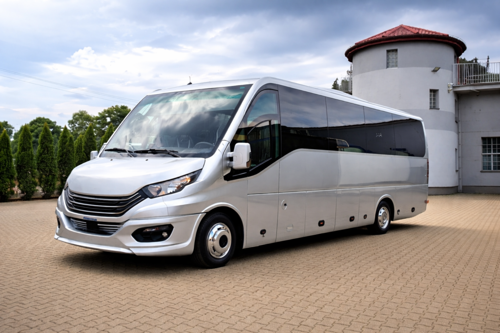 Group transport Europe luxury coach traveling through scenic Alps